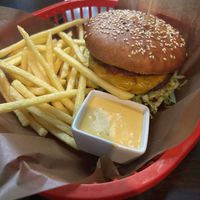 Chili burger with fries and cheese sauce  at Belzepub in Prague