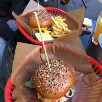 Our burgers and a portion of chips  at Belzepub in Prague