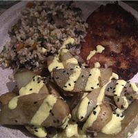 Seitan beef with mushroom rice and potatoes at Enjoy Vegan in Barcelona