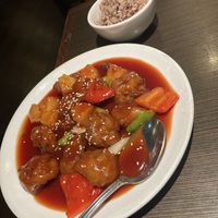 Sweet and sour soy protein with rice  at Indochine Vegan in San Francisco
