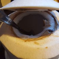 They will open the coconut for you so you can eat the meat at Indochine Vegan in San Francisco