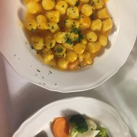 Gnocchi in squash sauce with steamed veg side at Trattoria Enzo e Piero in Florence