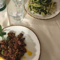 Seitan peposo and kale pesto pasta at Trattoria Enzo e Piero in Florence