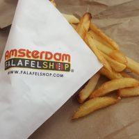 Amazingly crispy fries with dipping sauce options like mayo, peanut, garlic & BBQ. at Amsterdam Falafelshop - L'Enfant Plaza in Washington