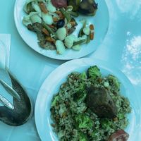 Not sure which dish my partner ended up with. Green rice wasn’t very flavourful and there was soooo much of it (pic doesn’t do justice).  at Ashkha in Arequipa
