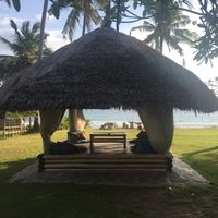 Chill in the comfy hut and enjoy the great veg food! at Coco Beach in 