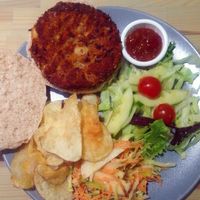 Vegan bean burger with chutney, salad, coleslaw and crisps at Roots Vegetarian Cafe in Lancaster