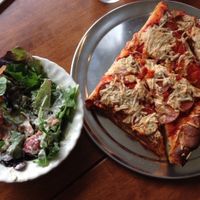 A variety of healthy greens and tasty pizza. at Fortuitea Cafe and Bakery in Washington