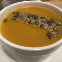 CREAM OF PUMPKIN AND SWEET POTATO WITH SPICES AND SEEDS  at El Vergel Veggie Restaurant in Tarragona