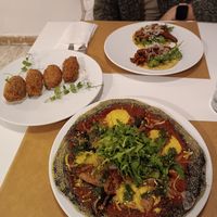 Black pizza, croquettes, tacos at El Vergel Veggie Restaurant in Tarragona