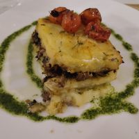 Potato pie with vegan protein and vegetables at El Vergel Veggie Restaurant in Tarragona