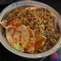 “Full Jikoni Kush Pocket w/ Tamu-Thai sauce
Thailand inspired! Perfect balance of spicy and sweet flavors to tantalize the pickiest of taste buds.”  at Jikoni Cafe at The House of Consciousness in Norfolk