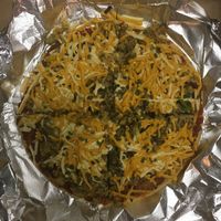 Kush Supreme Pizza at Jikoni Cafe at The House of Consciousness in Norfolk