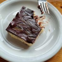 Vegan chocolate coconut slice 😋  They serve it warm. at Argyll Hotel Restaurant in Isle Of Iona