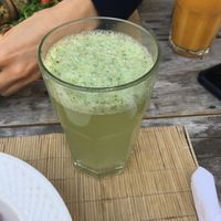 Ginger and mint lemonade//orange, carrot and papaya juice in the background at Vaikuntha Resto in Salta