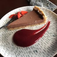vegan raw chocolate pie with strawberry sauce at Elephant Cafe in Ubud