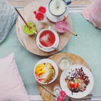 Smoothie bowl with fruit topping, gluten-free American pancakes with chocolate and nuts, smoothies and tea - yum!  at Fern & Fika in Stockholm