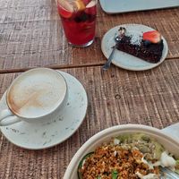 Taco bowl salad, cappuccino, Ice tea (home made), raw chocolate cake. at Fern & Fika in Stockholm