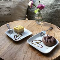 Raw cake cube and raw triple chocolate doughnut. at Fern & Fika in Stockholm