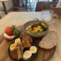 Breakfast platter (huge and only €9,95) with pancakes, tomato focaccia and vegan cilbir. The cilbir was great, the pancakes nice but the ricotta focaccia only decent. The chai with coconut-nut mylk as also only ok. at GYS - Voorstraat in Utrecht