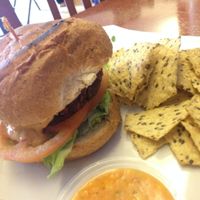 burger w chips and salsa! at Good Eden in New Orleans