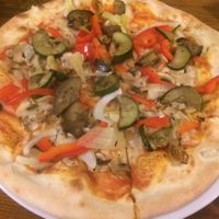 Veggie pizza. Good, but skimpy on sauce, cheese, and veggies.  at Vegan Pizza in Warsaw