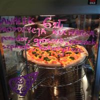 Pizza by slice at Vegan Pizza in Warsaw