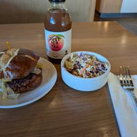 Pub burger, jalapeno coleslaw, and peach iced tea at Veggie Grill by Next Level in Pasadena