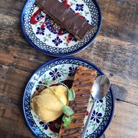 Snickers and biscoff cake with mango sorbet at ONDA in Helsinki