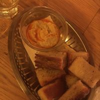 Focaccia looking bread with hummus dip (also got a GF option of bread, as well as a own dip for the GF bread) at ONDA in Helsinki