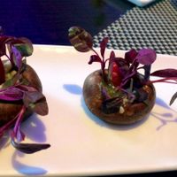 Crimini Pesto - stuffed mushrooms with Thai basil, pine nuts, bell peppers, sprouts at Au Lac - DTLA in Los Angeles