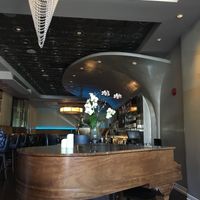 Piano in front of bar at Au Lac - DTLA in Los Angeles