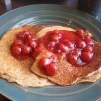 pancakes with cherry topping at World Peace Cafe in Baltimore