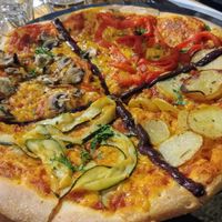 4 corners pizza at Vege Rama in West End
