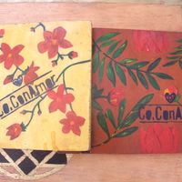 Here are the beautiful hand painted menu books at CoConAmor.  at Co.ConAmor in Tulum