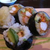 Mumbai Futomaki : Vegan shrimp in tempura, green onion, avocado, sweet potato and curry sauce.

You can definitely taste the curry in this one and it's pretty spicy. Highly recommended. at Sushi Momo in Montreal