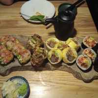 6pc (lamba -can't remember name), eggplant flame fried rice, momo (tasted like a cheeseburger!), (can't remember roll name) at Sushi Momo in Montreal