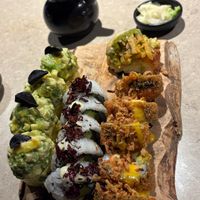 Our 3 sushi rolls and a krispy rice at the back (you actually get 2 krispy rice, but I already ate one) at Sushi Momo in Montreal