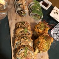 Clockwise starting on top: 3 champions, momo, Fuji flambé, gyu  at Sushi Momo in Montreal