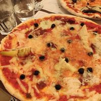Pizza with olives, artichokes, ham and cheese (they ran out of mushrooms) at Origano Trevi in Rome