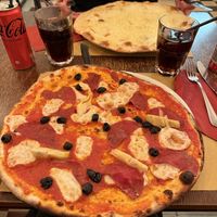 Pizza diavolo with olives and artichokes   at Origano Trevi in Rome
