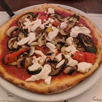 Origano vegan pizza with aubergine, mushrooms, peppers and tofu at Origano Trevi in Rome