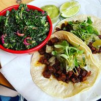 Chorizo Seitan Tacos with a side of Kale Salad  at Jungle Cafe in Brooklyn