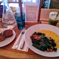 Macaroni cheese with kale, fake bacon bits with a side of delicious bread and vegan butter. Featuring a 'cool breeze' green juice! at Jungle Cafe in Brooklyn