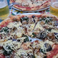 Pizza Funghi and Vegetariana with vegan cheese. at Licchio's Bar in Taormina