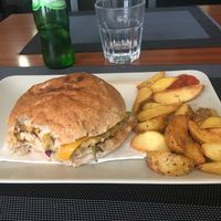 Bite out of burger at Black Mamba Burgers and Records in Porto