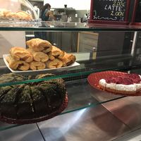 Desserts-bottom left is chocolate cake with peanut butter filling. On the right is their cheesecake. at Black Mamba Burgers and Records in Porto