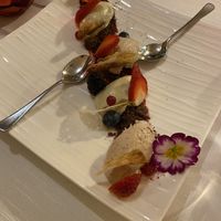 Two different types of mouse complimented by strawberries and blackberries    at Ristorante Da Mario alla Fava in Venice