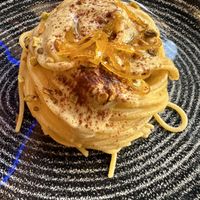 Corn spaghetti w/ Bronte pistachio crème + hints of citrus & bitter cocoa powder - delish!!  at Ristorante Da Mario alla Fava in Venice