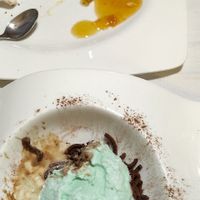 Half eaten peach cheesecake and spaghetti mint after 8 at Ristorante Da Mario alla Fava in Venice